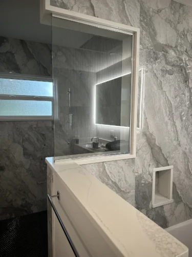 Newly finished walk-in shower after bathroom remodel